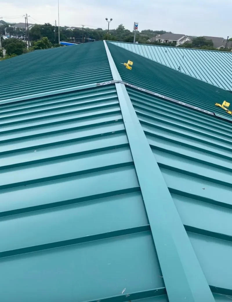Green commercial metal roof ridge and valley for Metal Roof Repair in Taylor